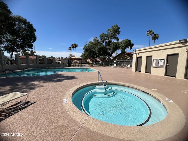 2154 E Forge Ave, Mesa, AZ 85204 - community pool with a community hot tub and a patio
