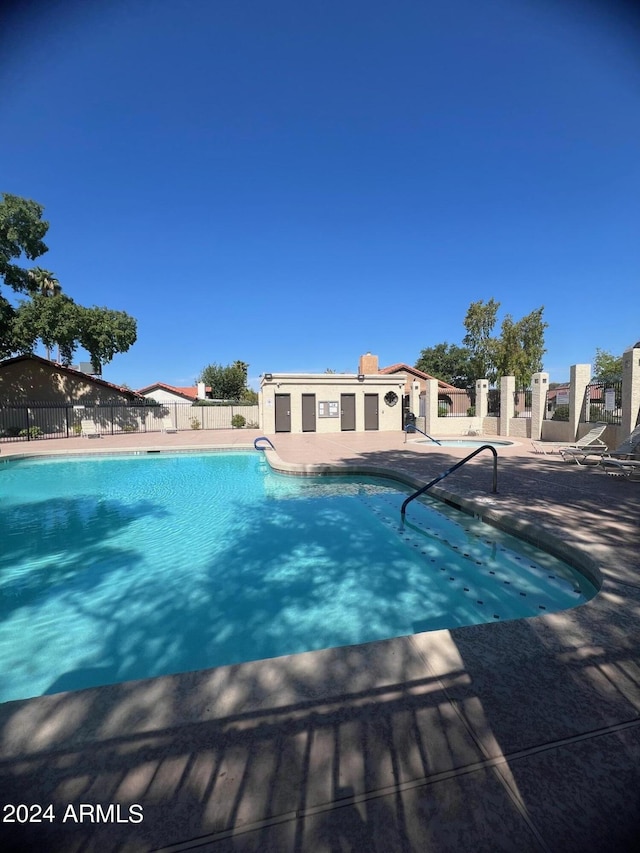 2154 E Forge Ave, Mesa, AZ 85204 - community pool featuring a patio