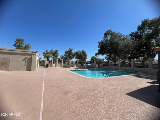 2154 E Forge Ave, Mesa, AZ 85204 - community pool featuring a patio area