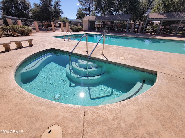 view of swimming pool featuring a patio