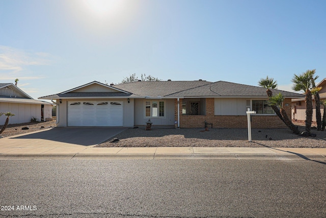 single story home with a garage