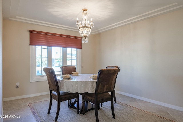 dining room featuring a chandelier and light tile patterned flooring