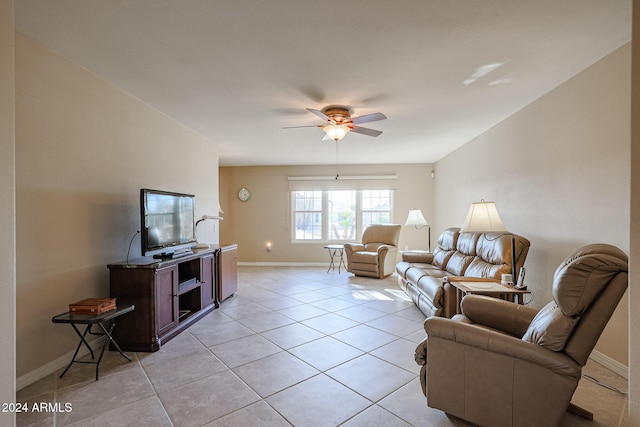 tiled living room featuring ceiling fan