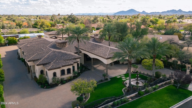 birds eye view of property featuring a mountain view