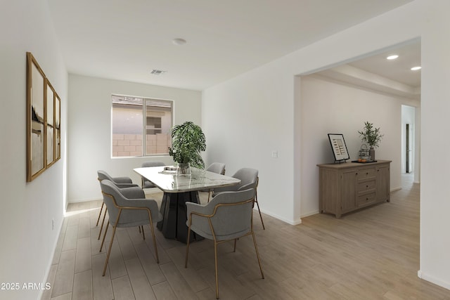 dining area featuring light hardwood / wood-style flooring