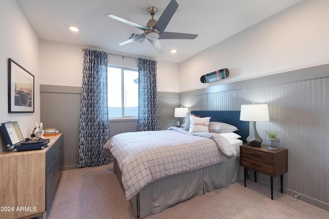 carpeted bedroom with ceiling fan