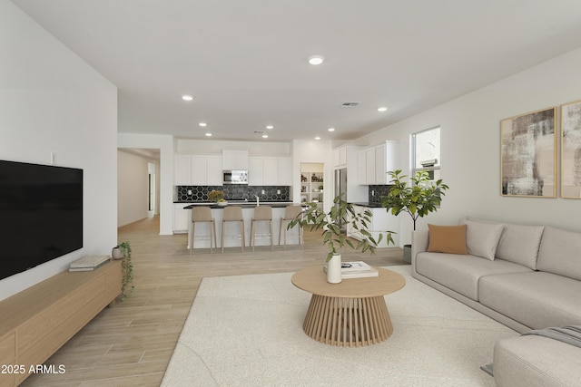 living room with light wood-type flooring