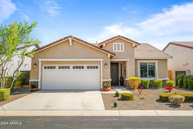 view of front of home with a garage