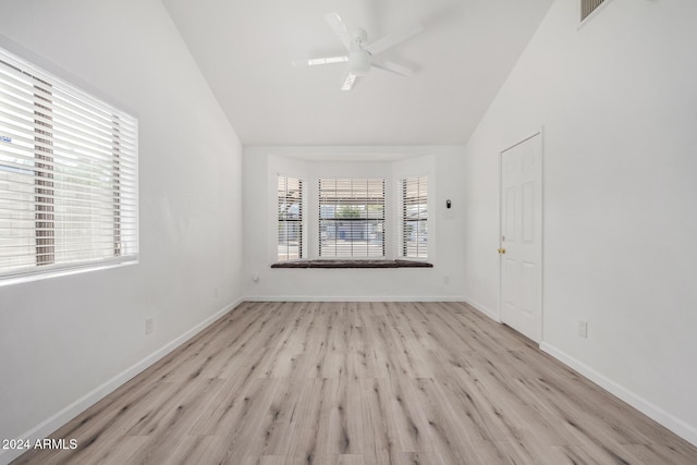 1818 E Monterey Way, Phoenix, AZ 85016 - unfurnished room featuring vaulted ceiling, wood finished floors, and a ceiling fan