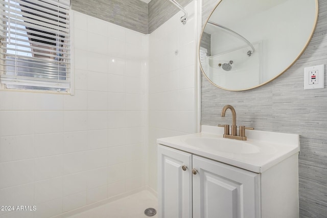1818 E Monterey Way, Phoenix, AZ 85016 - full bathroom with vanity, a tile shower, and tile walls