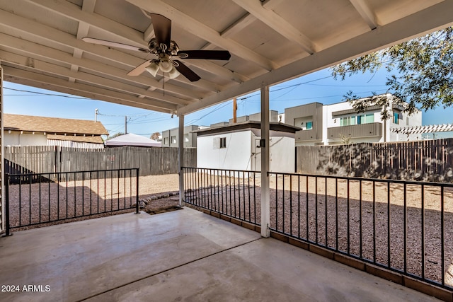 view of patio / terrace with a storage shed