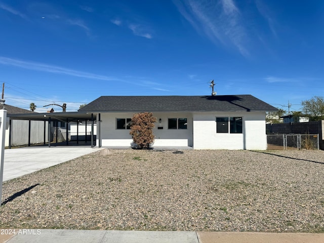 view of front of house featuring a carport