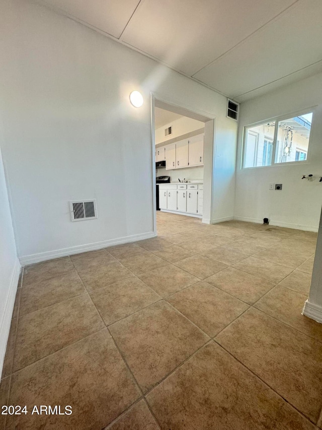 interior space featuring light tile flooring