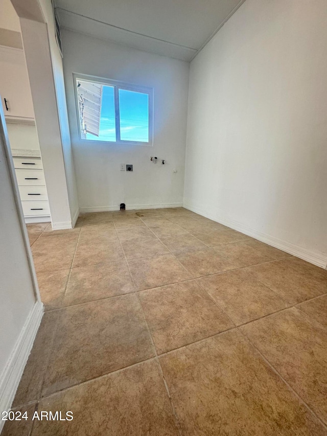 view of tiled spare room