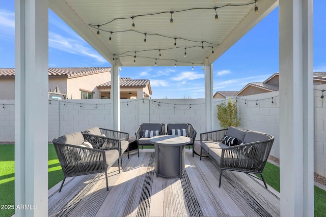 wooden deck featuring an outdoor living space