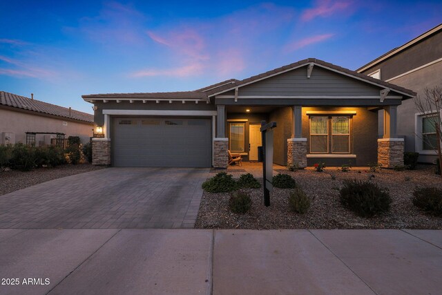 view of front of property featuring a garage