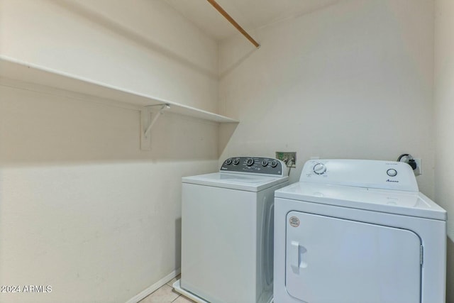 laundry room featuring independent washer and dryer