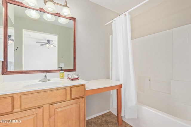 bathroom featuring shower / bath combo, vanity, and a ceiling fan
