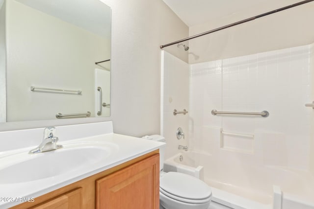 full bath featuring toilet, vanity, and shower / bath combination