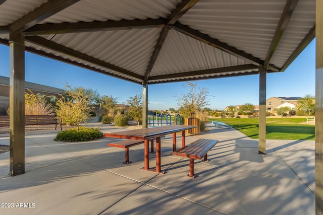 view of patio / terrace with outdoor dining space and a gazebo