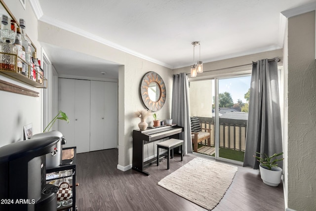 foyer entrance featuring dark hardwood / wood-style flooring and ornamental molding