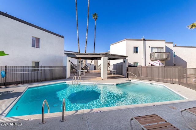 view of pool featuring a patio area