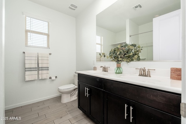 17652 W Fetlock Trl, Surprise, AZ 85387 - full bath featuring double vanity, wood finished floors, and a shower