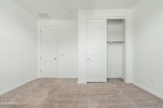 17652 W Fetlock Trl, Surprise, AZ 85387 - unfurnished bedroom featuring carpet and a closet