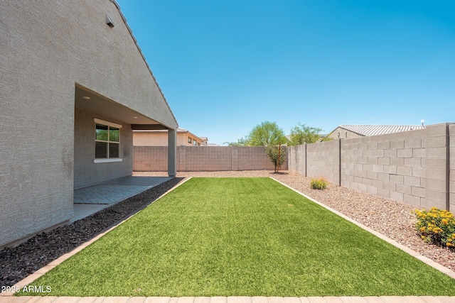 17652 W Fetlock Trl, Surprise, AZ 85387 - fenced backyard featuring a patio