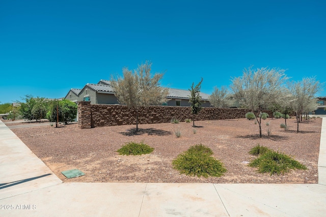 17652 W Fetlock Trl, Surprise, AZ 85387 - view of front of property with a tiled roof and stucco siding