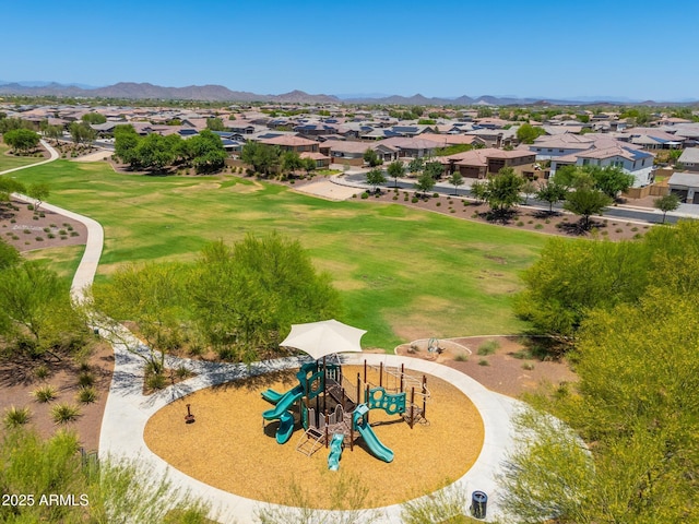 17652 W Fetlock Trl, Surprise, AZ 85387 - aerial view of residential area featuring a recreational park and a mountainous background