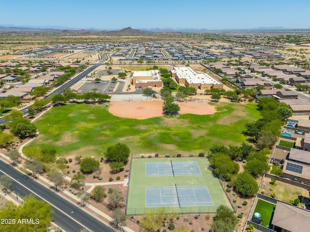 17652 W Fetlock Trl, Surprise, AZ 85387 - aerial view of property's location featuring a mountainous background and nearby suburban area