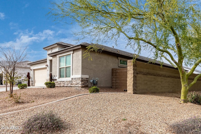 view of property exterior featuring a garage