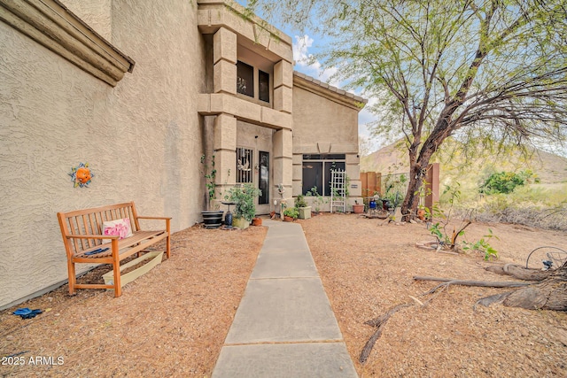 exterior space featuring stucco siding