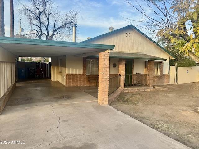 view of front of property with a carport