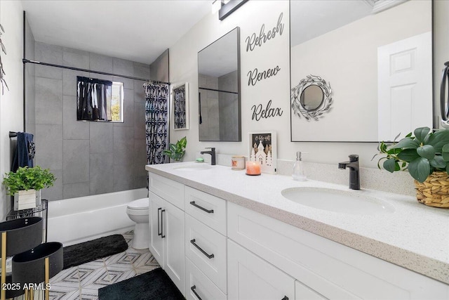 full bathroom with vanity, shower / bath combination with curtain, and toilet