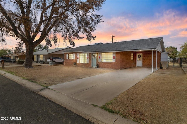 single story home featuring a carport