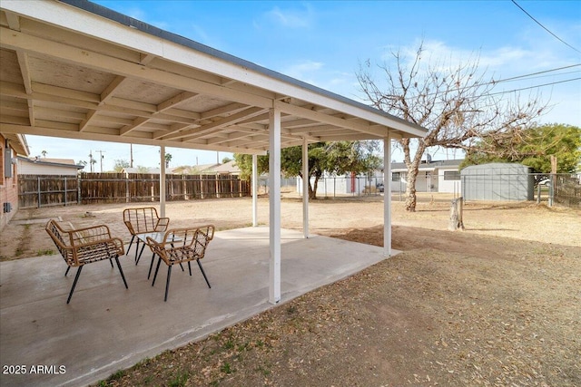 view of patio / terrace with a storage unit