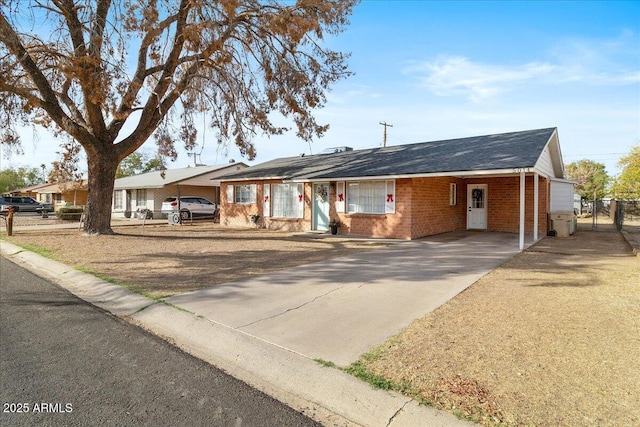 ranch-style home with a carport