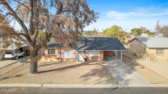 view of front of property with a carport