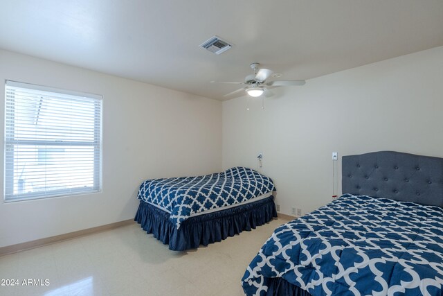 bedroom featuring ceiling fan