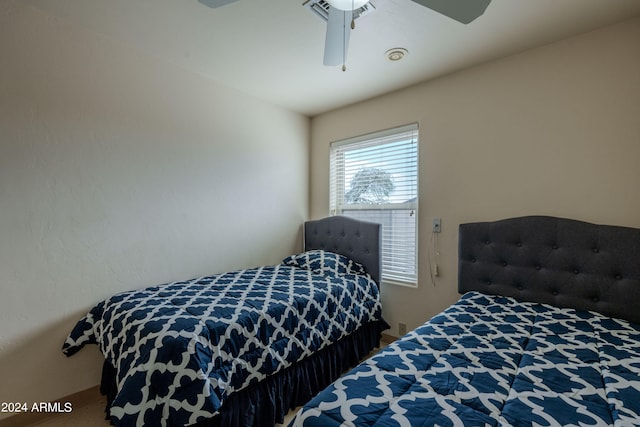 bedroom featuring ceiling fan