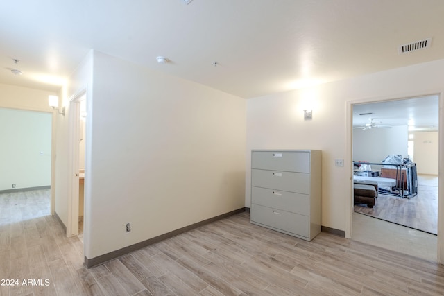 interior space featuring ceiling fan and light wood-type flooring