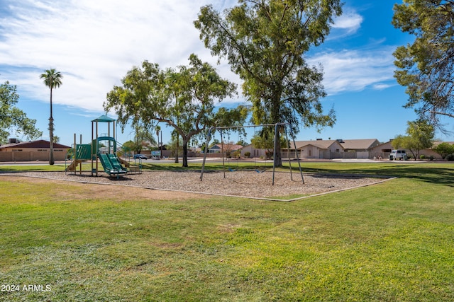 view of playground with a yard