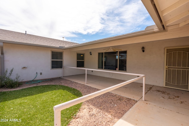 exterior space featuring ceiling fan and a patio