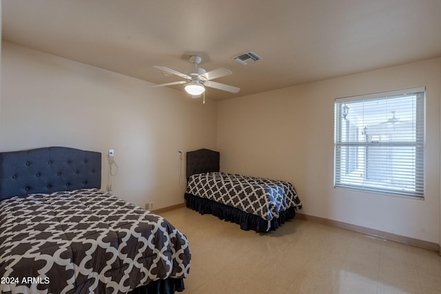 bedroom featuring ceiling fan