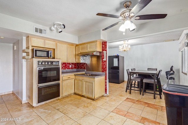 kitchen with light brown cabinetry, ceiling fan with notable chandelier, tasteful backsplash, and black appliances