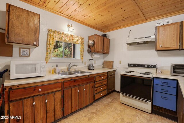 197 S Hiscox Ln, Payson, AZ 85541 - kitchen with white appliances, under cabinet range hood, wood ceiling, light countertops, and ornamental molding