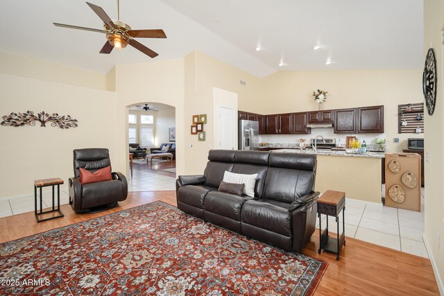 835 W Beechnut Dr, Chandler, AZ 85248 - living area featuring ceiling fan, high vaulted ceiling, and light wood-type flooring
