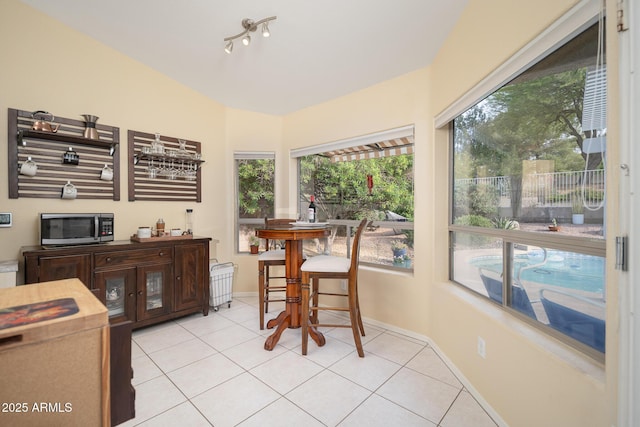 835 W Beechnut Dr, Chandler, AZ 85248 - dining space with light tile patterned floors and baseboards